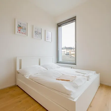 The Elegant White In Smichovcity By Rentez Prag